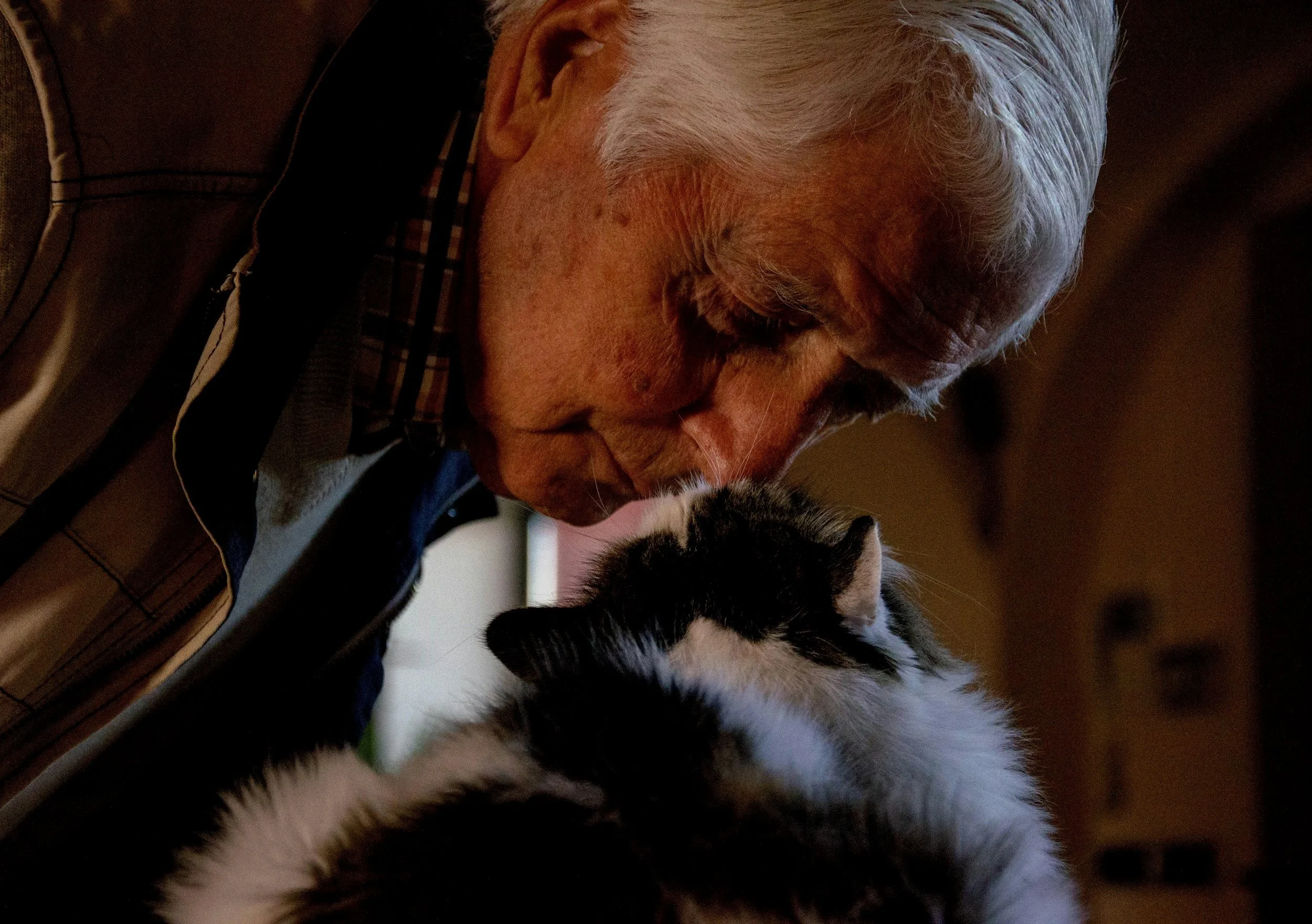Senior man with a cat