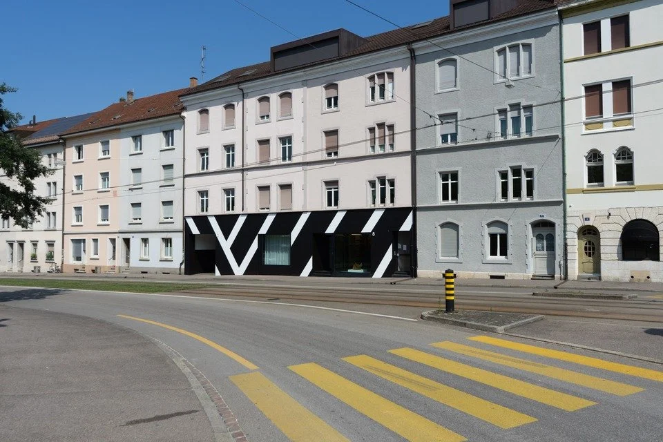 Supergraphic on the exterior of von Bartha, Basel, Switzerland