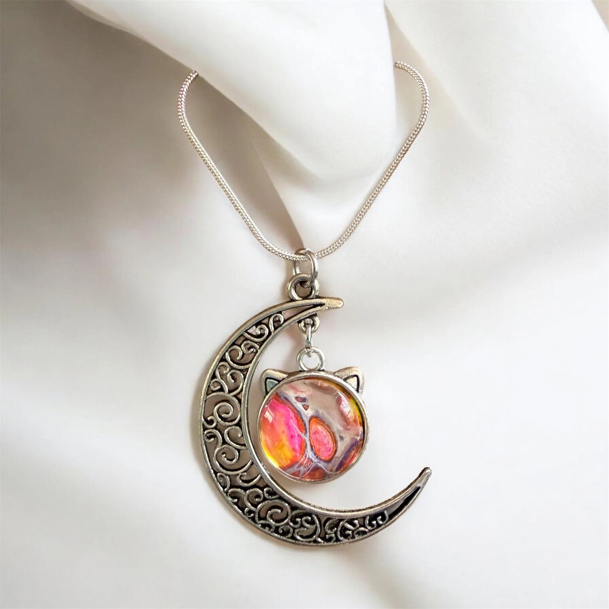 Cat and Moon Pendant Necklace
$35