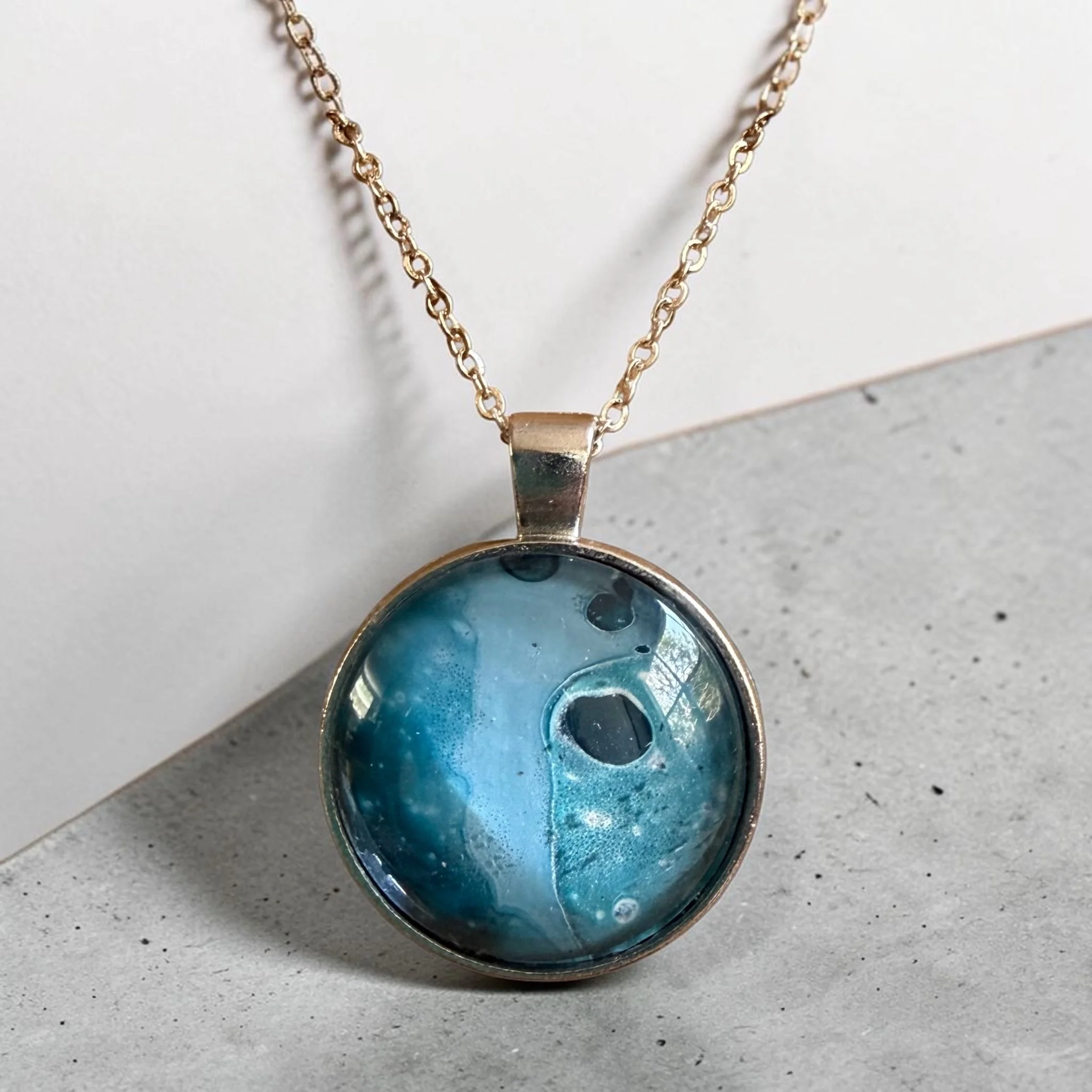 Blue Ocean Pendant Necklace
$35