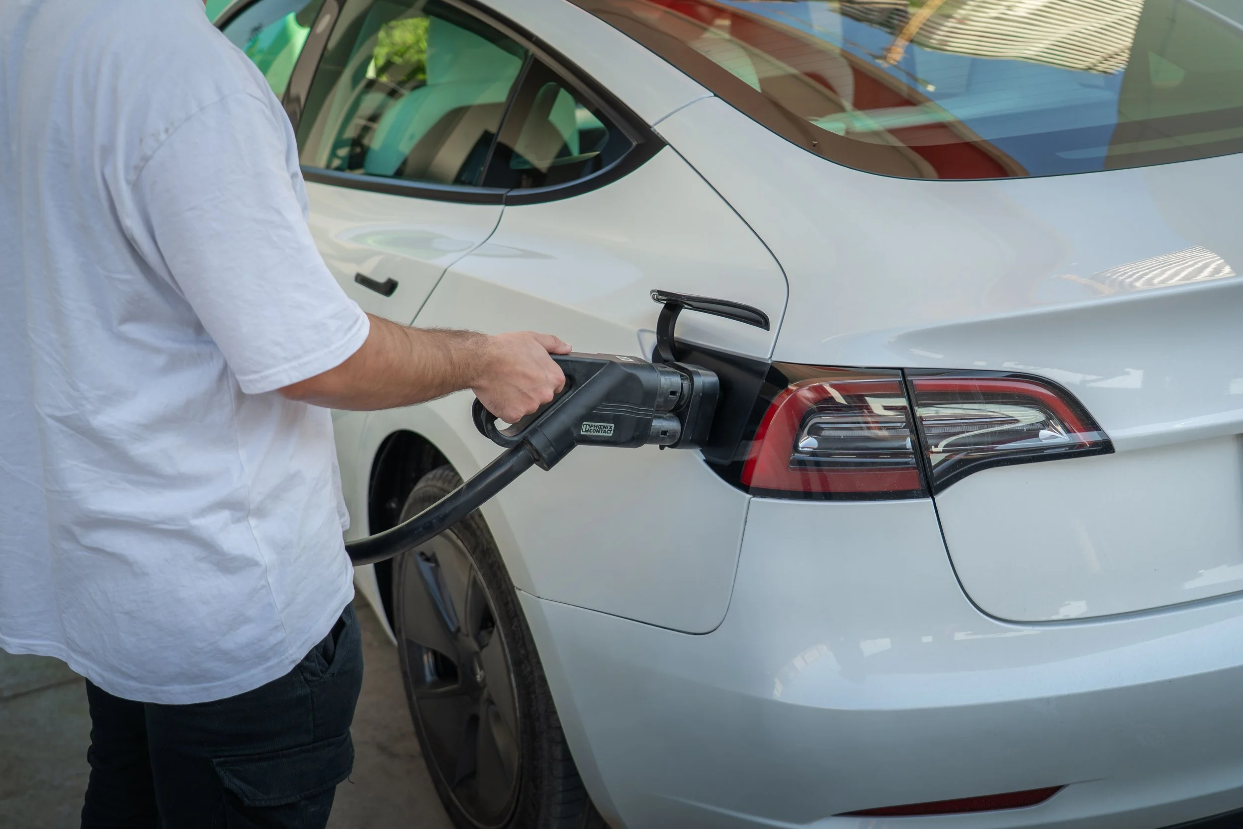 EV charging a car