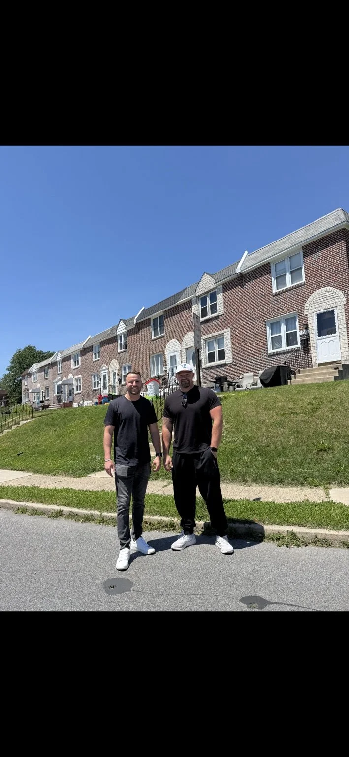 Kevin and Bobby of DeLaw Acquisitions standing in a Delaware County neighborhood they serve as local home buyers.