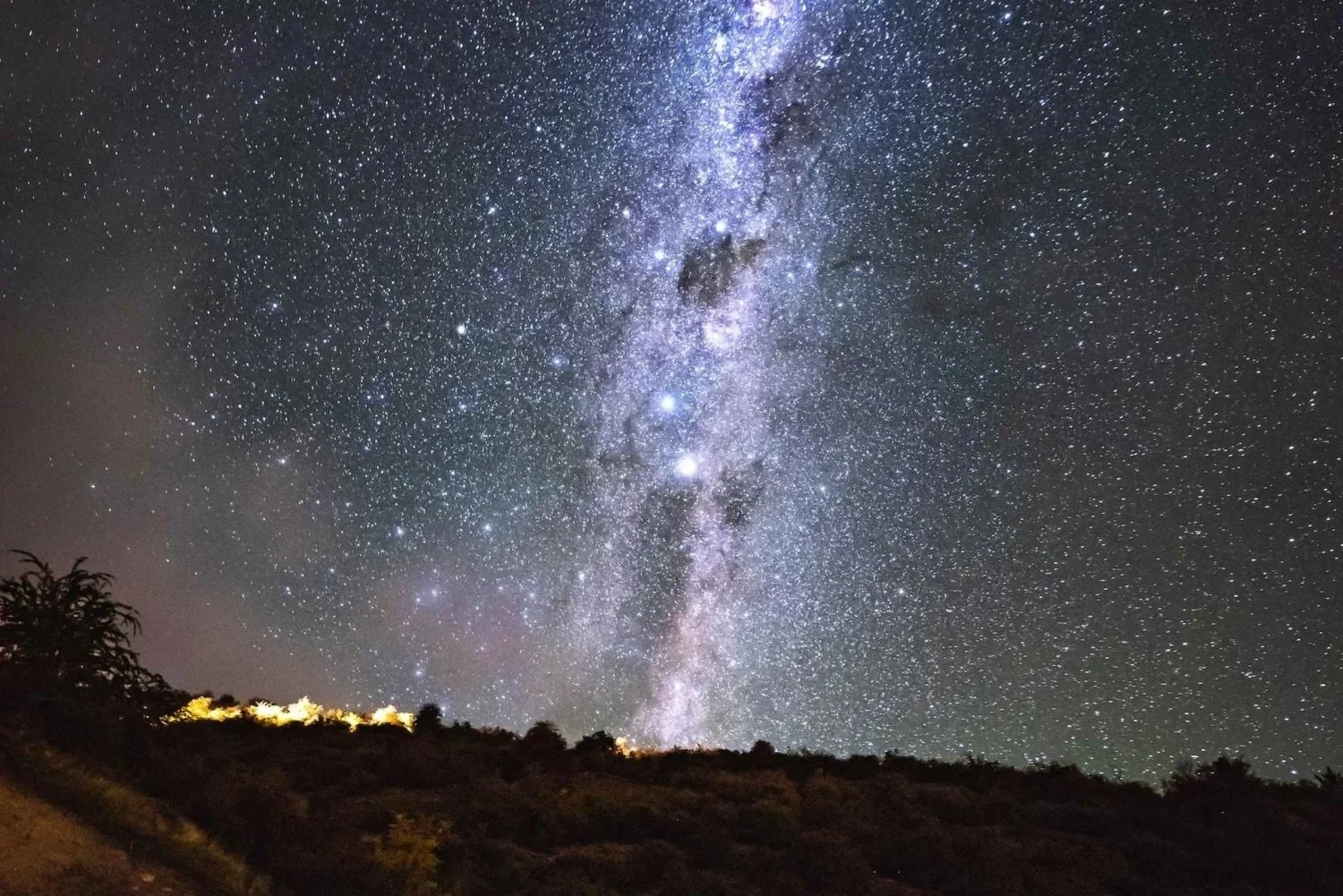 Milky Way visible in the night sky near Woodhouse Mountain Lodge on the Matakana Coast, New Zealand.