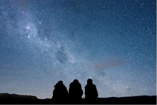Stargazing under the Milky Way near Woodhouse Mountain Lodge on the Matakana Coast, New Zealand.