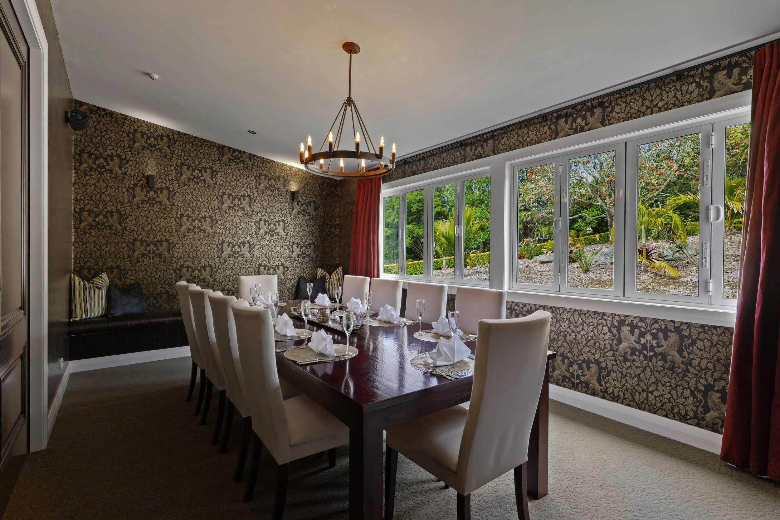 Private dining room at Woodhouse Mountain Lodge in Matakana set for a group dining experience.