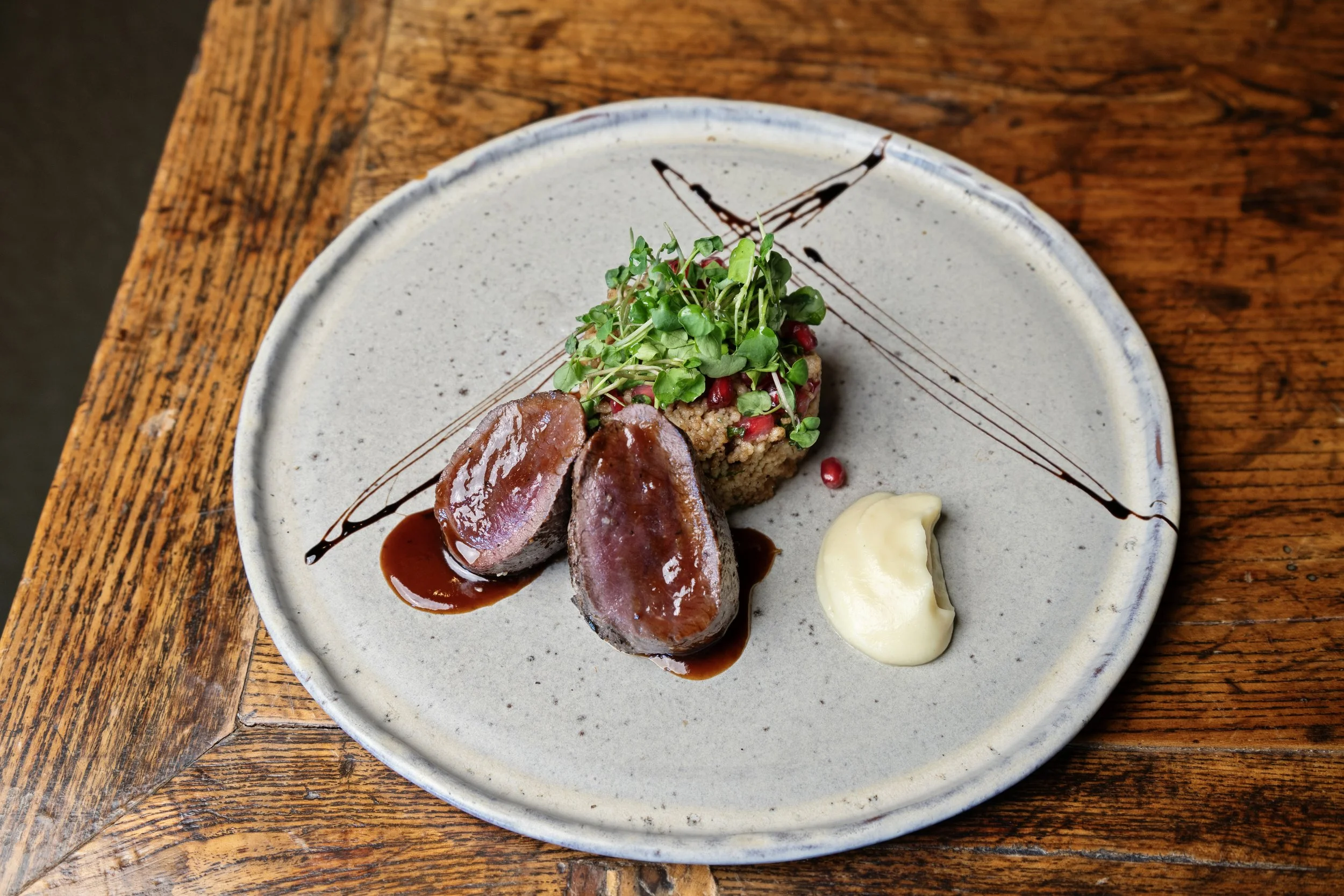 Seasonal dining at Woodhouse Mountain Lodge in Matakana featuring fresh local ingredients.