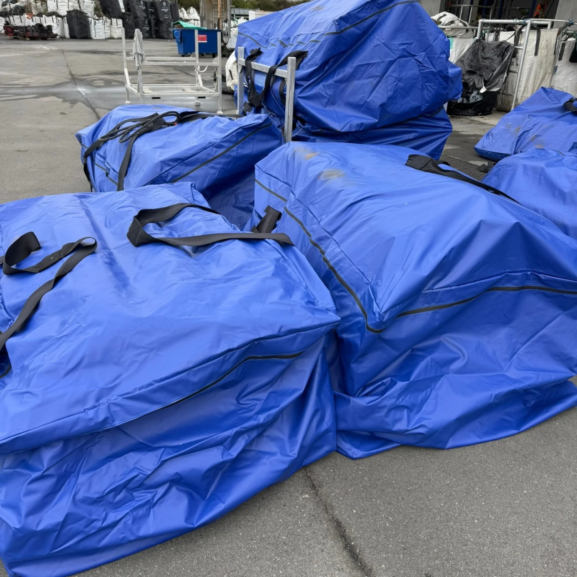 Stacks of Mussock DryBag holding knitted mussock socking
