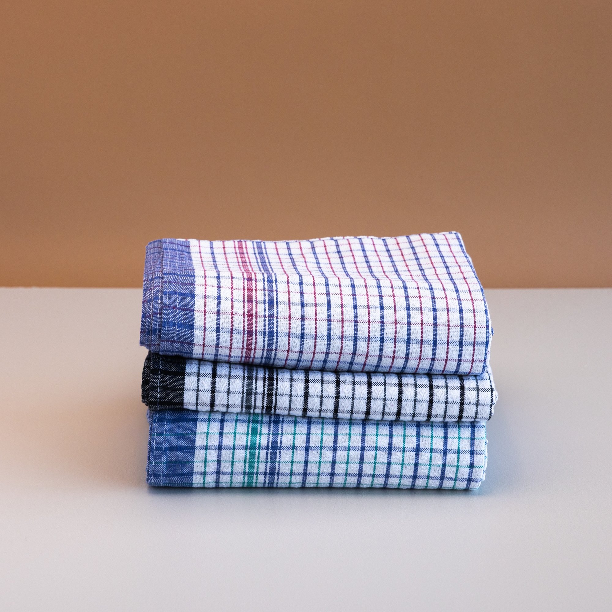 Cotton check tea towels folded — commercial hospitality tea towels New Zealand