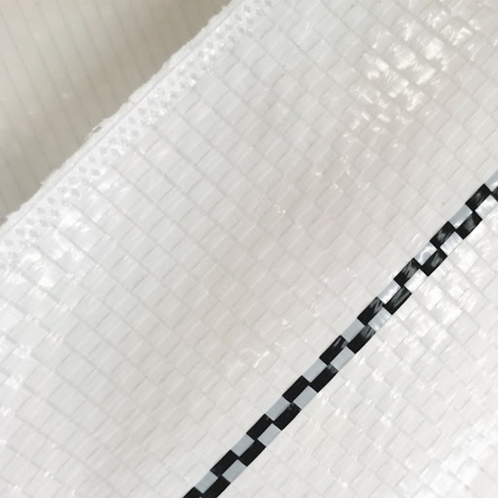 Close-up of a white reflective ground cover