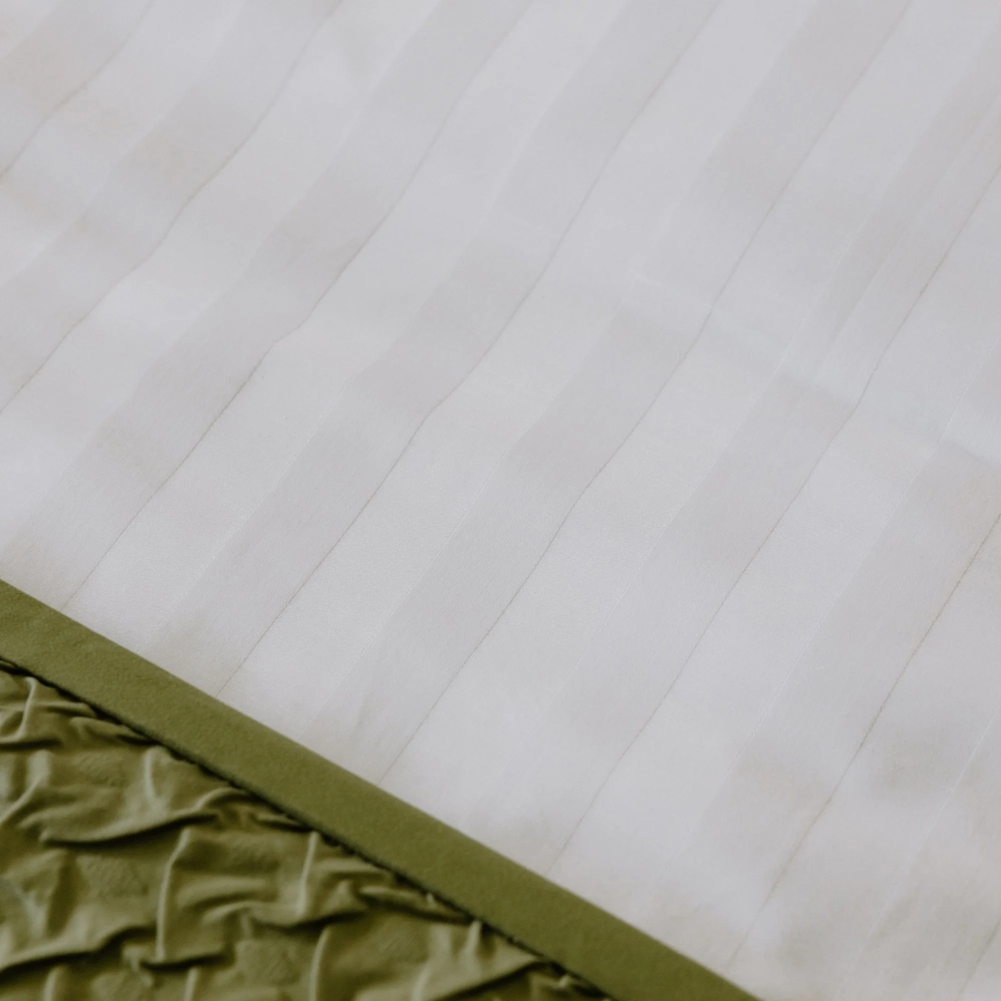 Close-up image of white 25mm Rutherford Striped Sheet set.