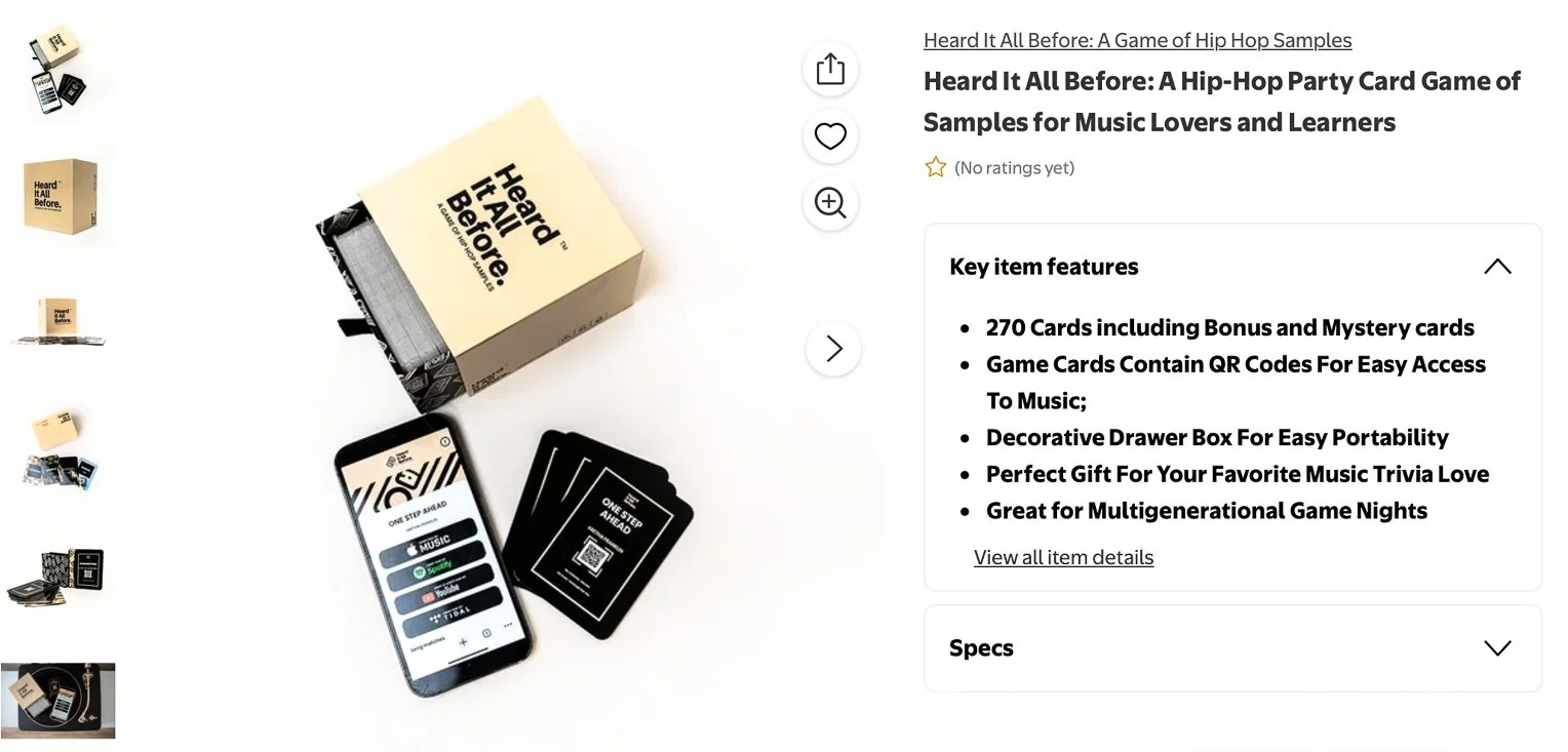 Hip-hop themed card game called Heard It All Before, with a box, 270 cards including bonus and mystery cards, a smartphone displaying the game interface, and black cards with QR codes for music access.