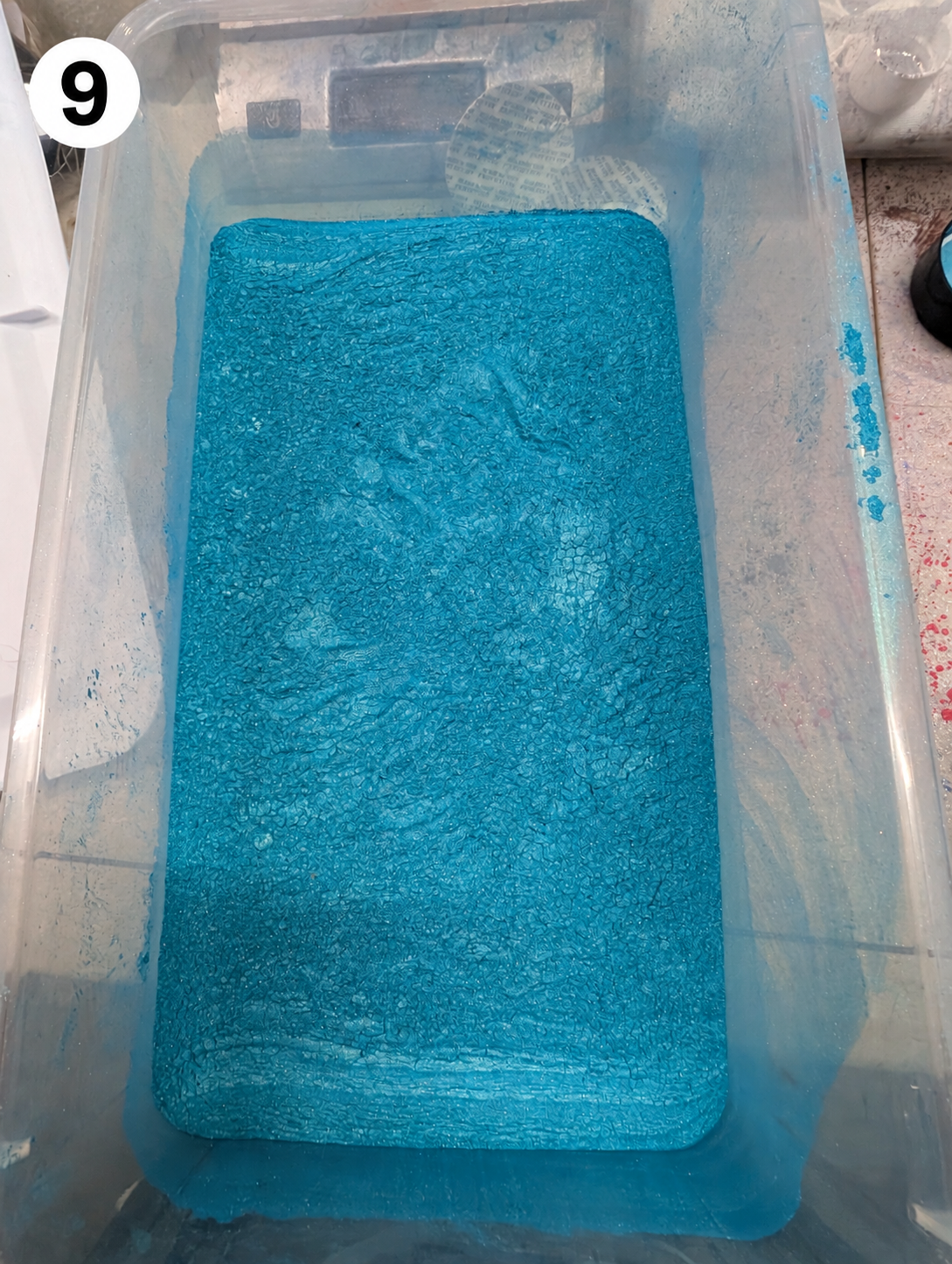 Powder Container with Number 9 Badge.png