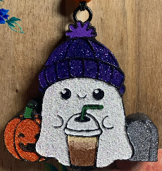 Ghost with drink and pumpkin