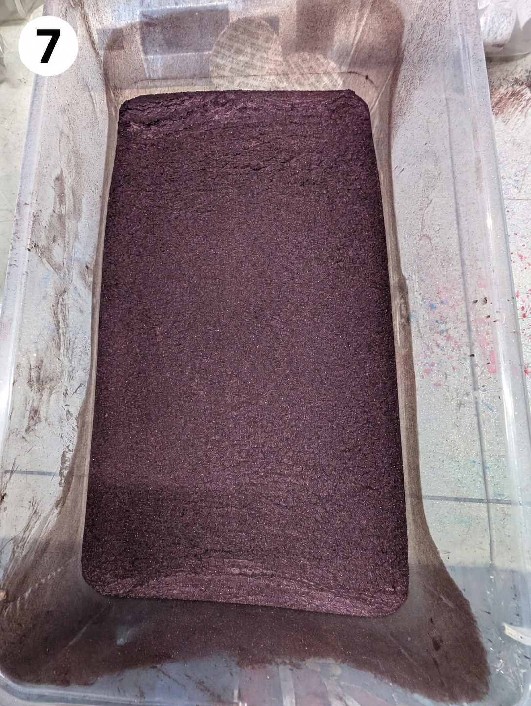 Powder container with number seven badge.png