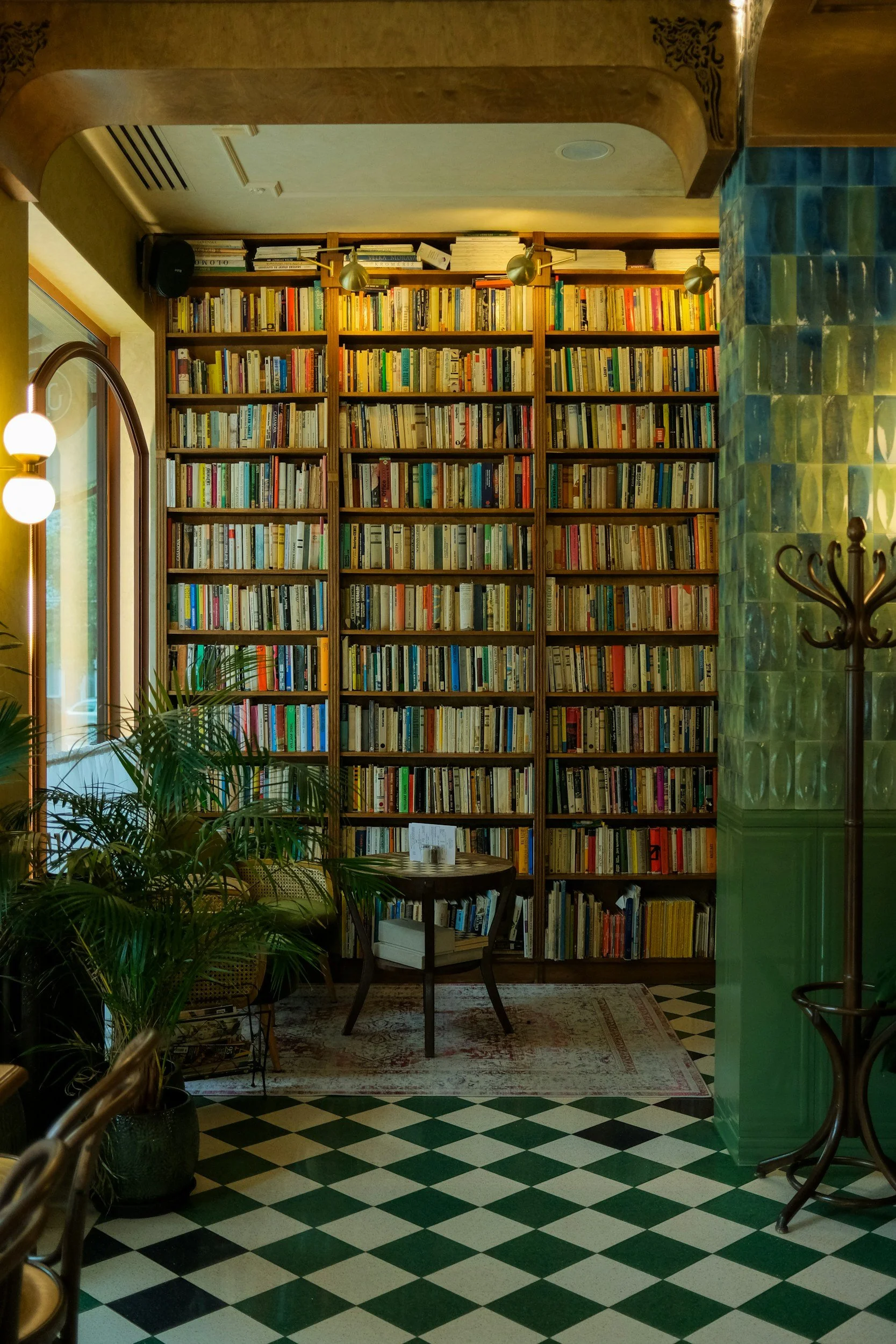 Cozy bookshop interior with tall bookshelves