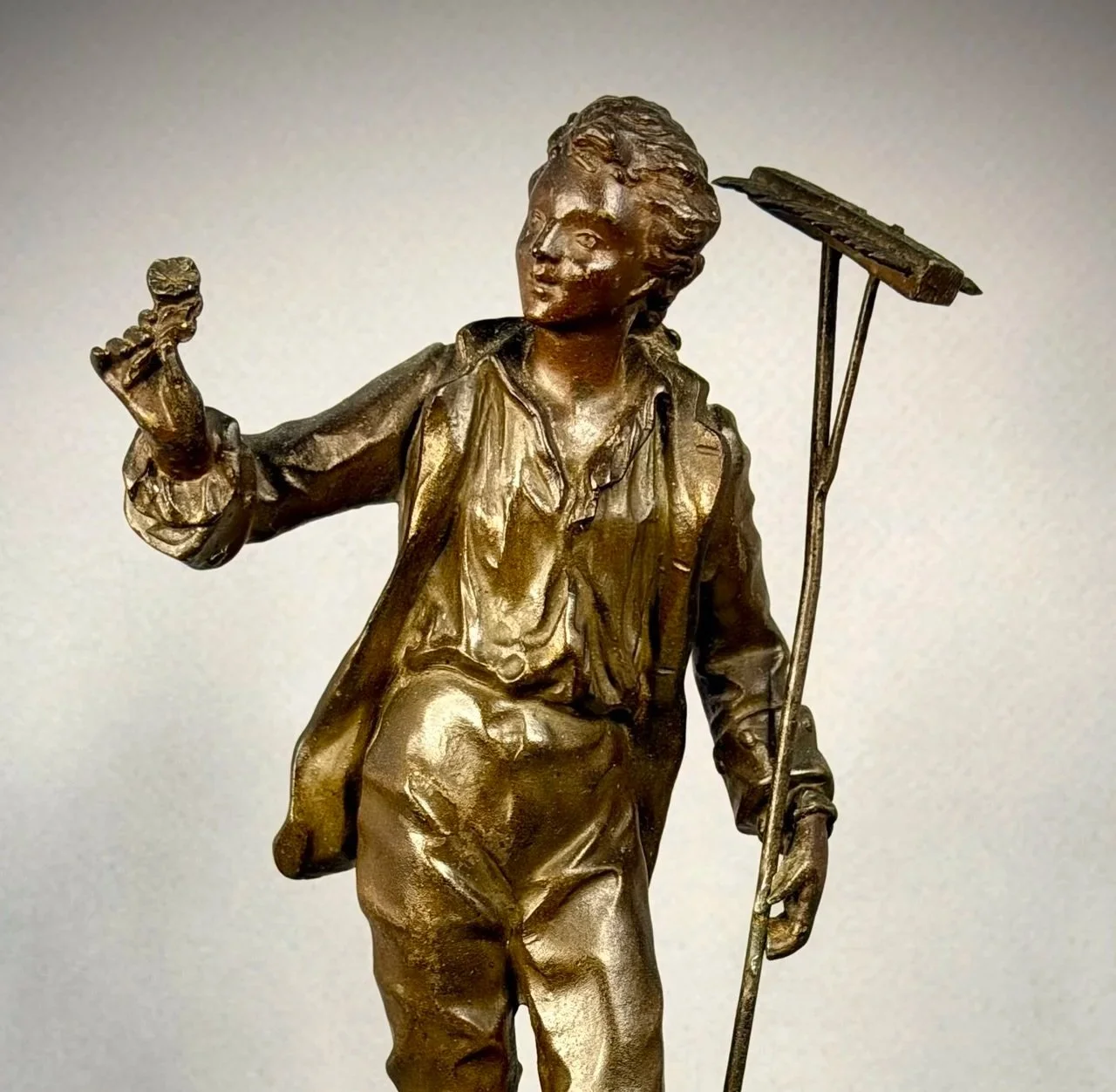 The Boy with the Rake
