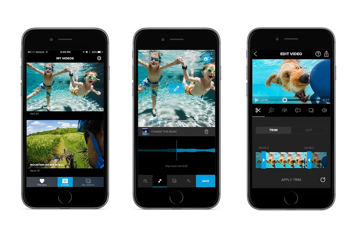 Three smartphones in a row displaying video editing screens. The first shows a video gallery with footage of children swimming and a mountain biking trip. The second shows a video of children swimming with an option to change music. The third shows a video of a dog swimming with editing options for trimming and cutting.