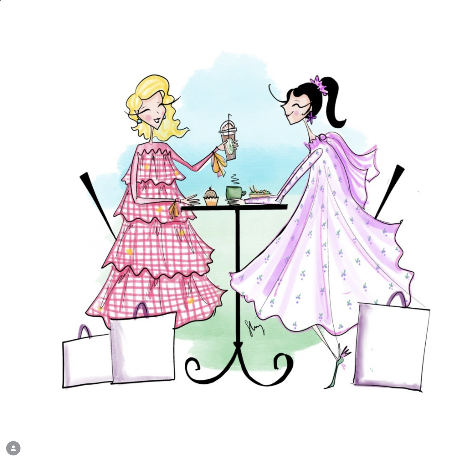 Two women sitting at a table outdoors, enjoying drinks and snacks, dressed in pink and purple dresses with floral and checkered patterns, smiling and chatting happily.