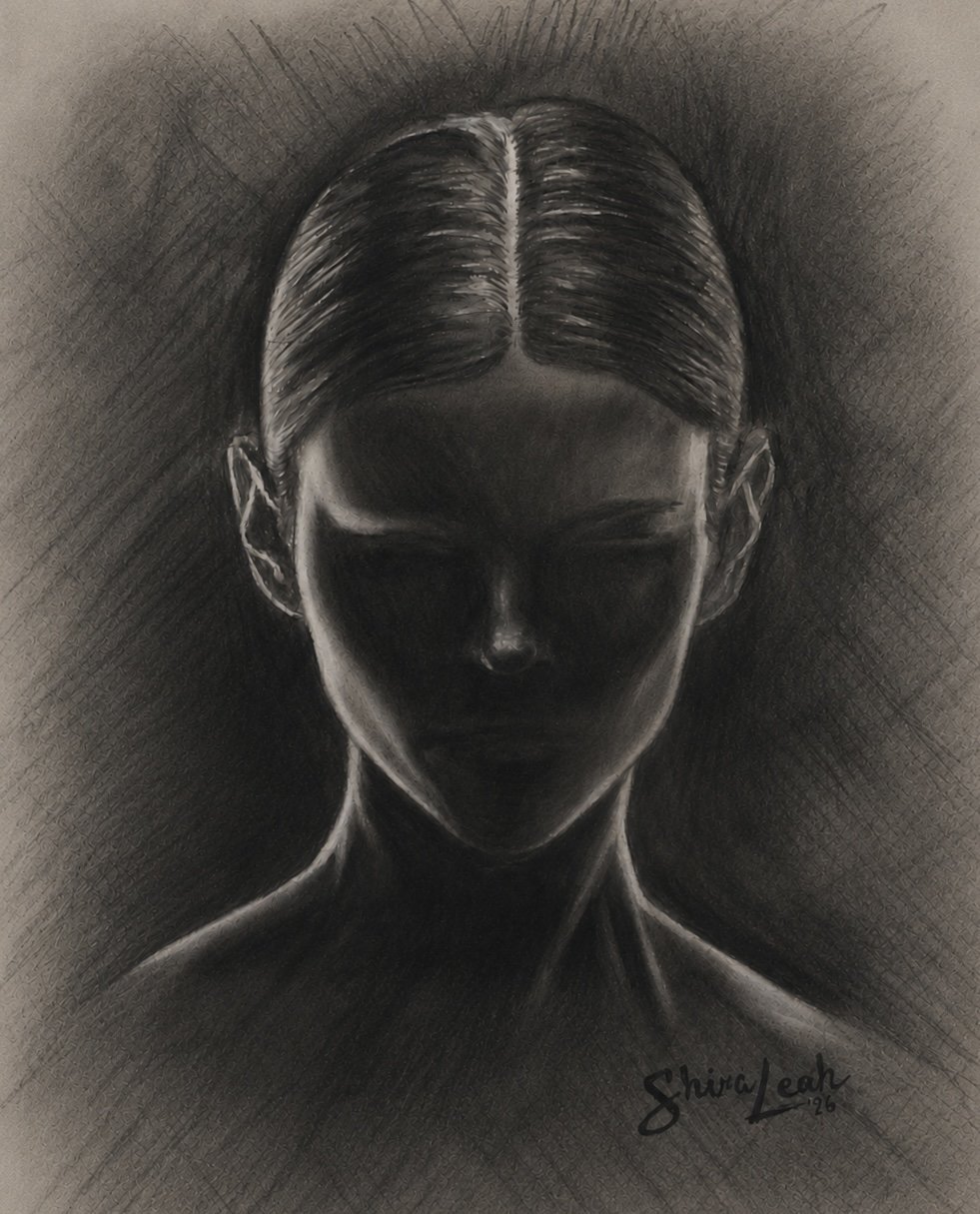 A black and white drawing of a woman's face, with her eyes closed and hair pulled back, creating a contrast with her facial features.