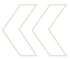 Three black chevron shapes pointing to the left on a black background.
