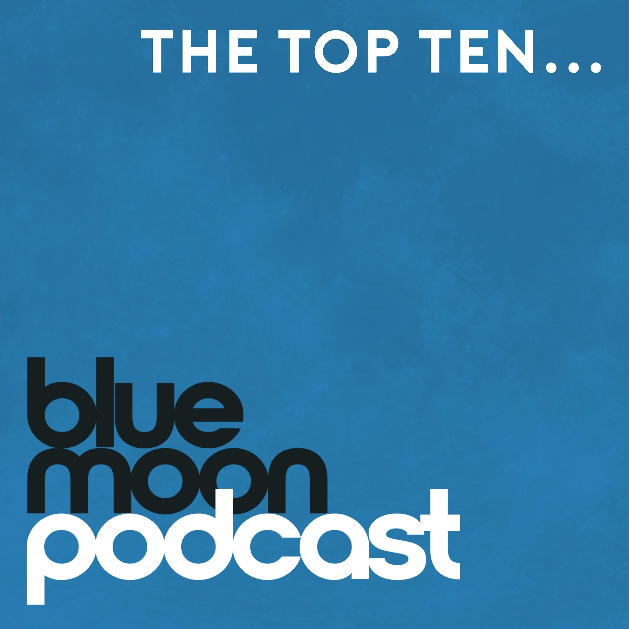 Close-up of a blue background with white text that reads "THE TOP TEN..." and part of black text below that says "blue" and part of black text below that says "coast". The full sentence or phrase is partially visible.
