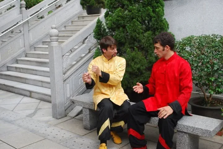 Discussing Kung Fu after a photoshoot with his student and good friend Sifu Claudio Legname Caradonna