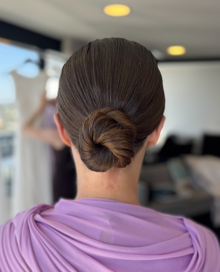 sleek brown low bun