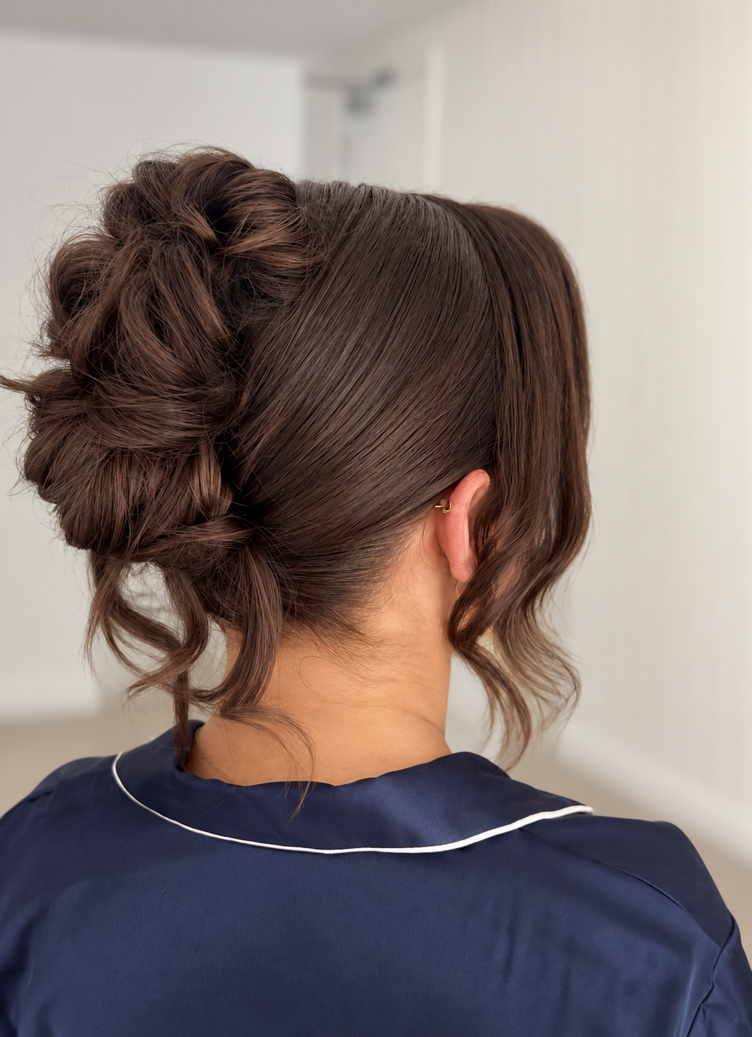 brunette bridesmaid with modern up style
