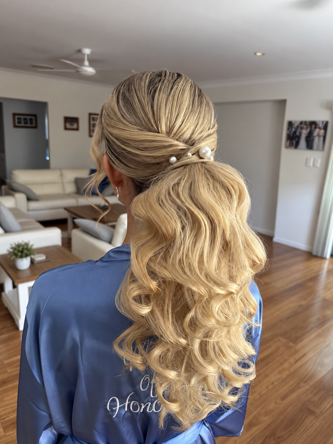 long thick bridesmaid curly pony wth extensions and pearl hair accents