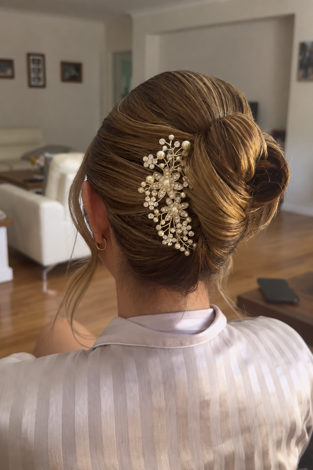mother of the bride hair style with side hair piece feature, French twist inspired up style