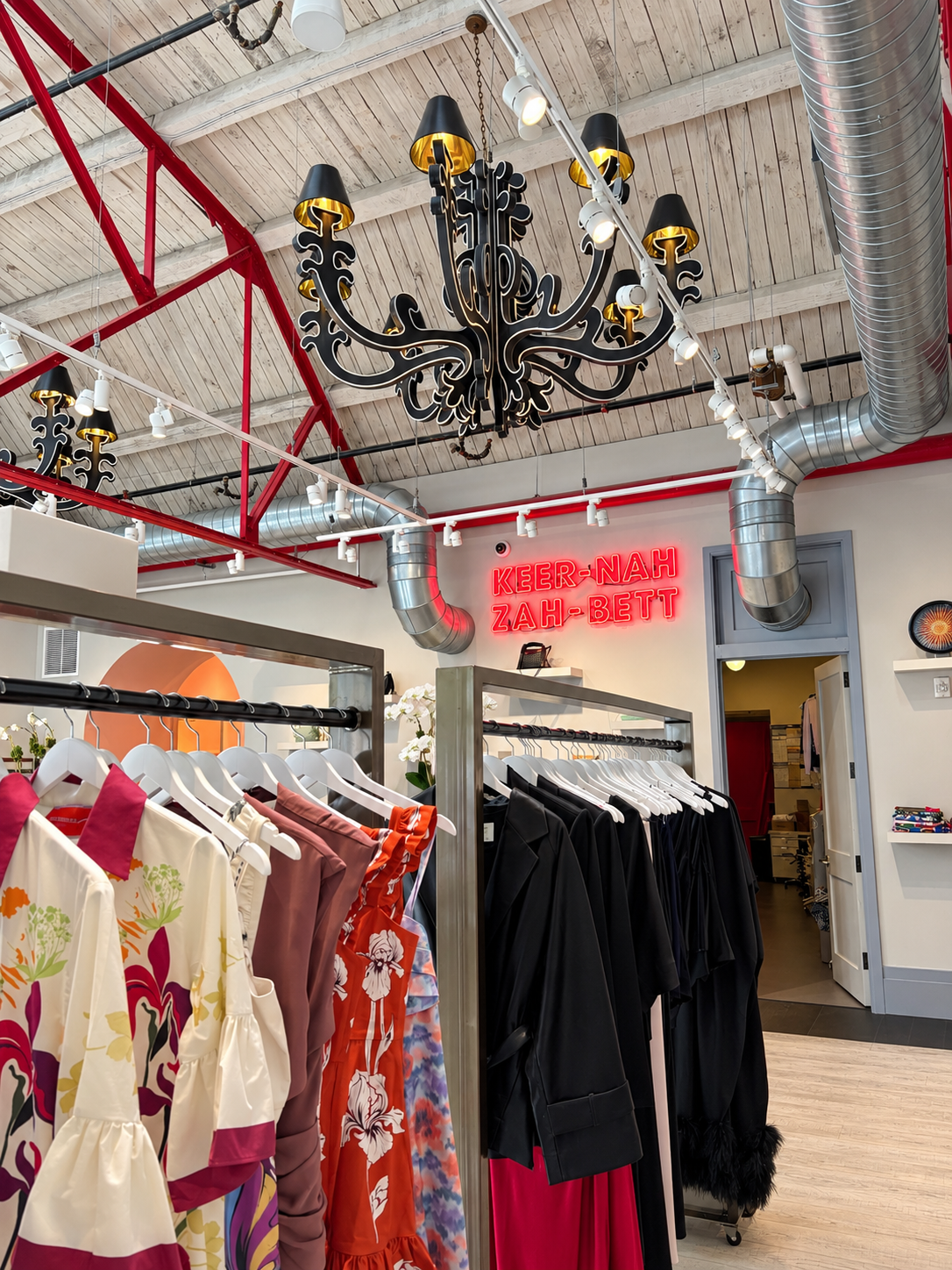 Fashion boutique interior with clothing displays