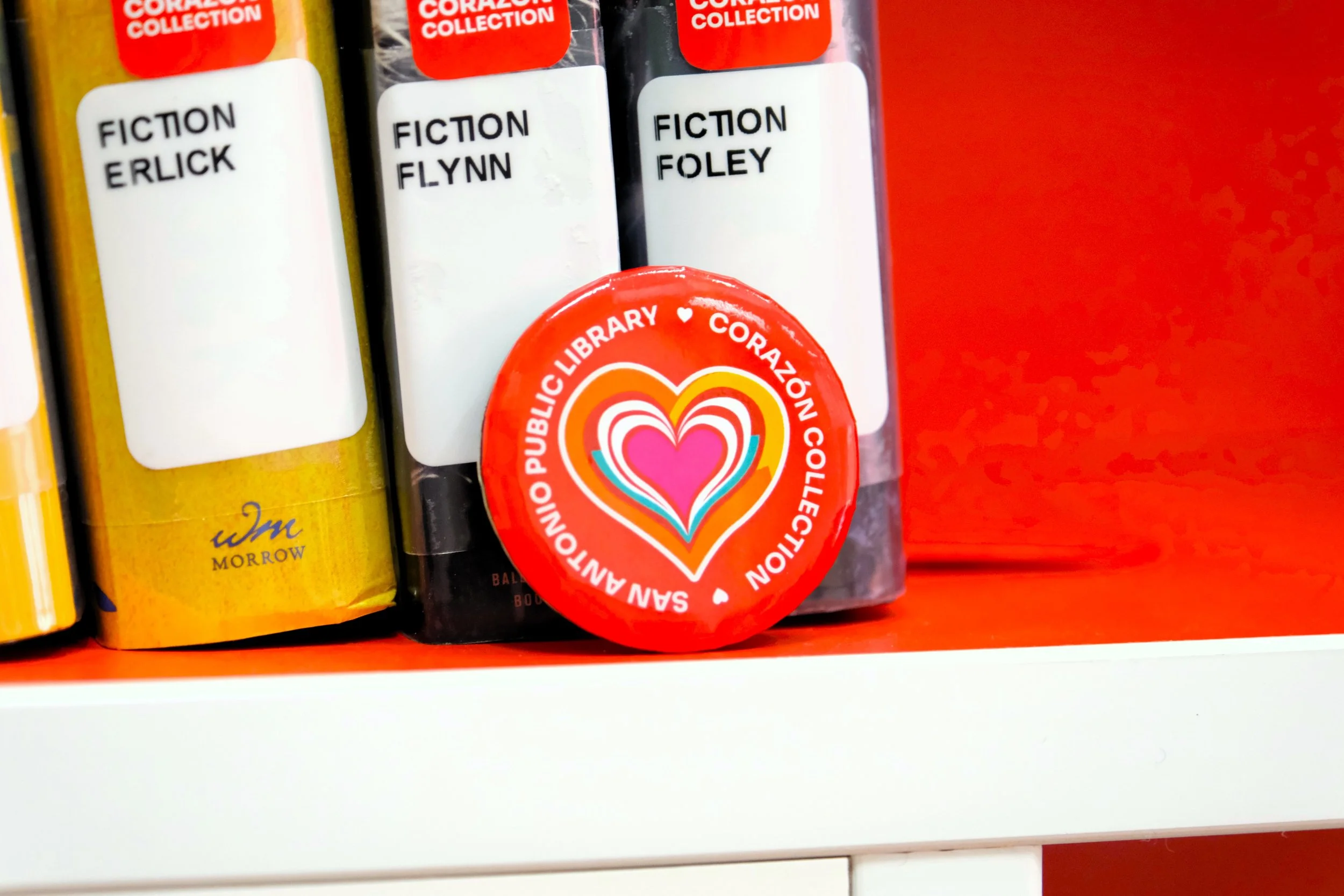 Corazón Collection books and button.JPG