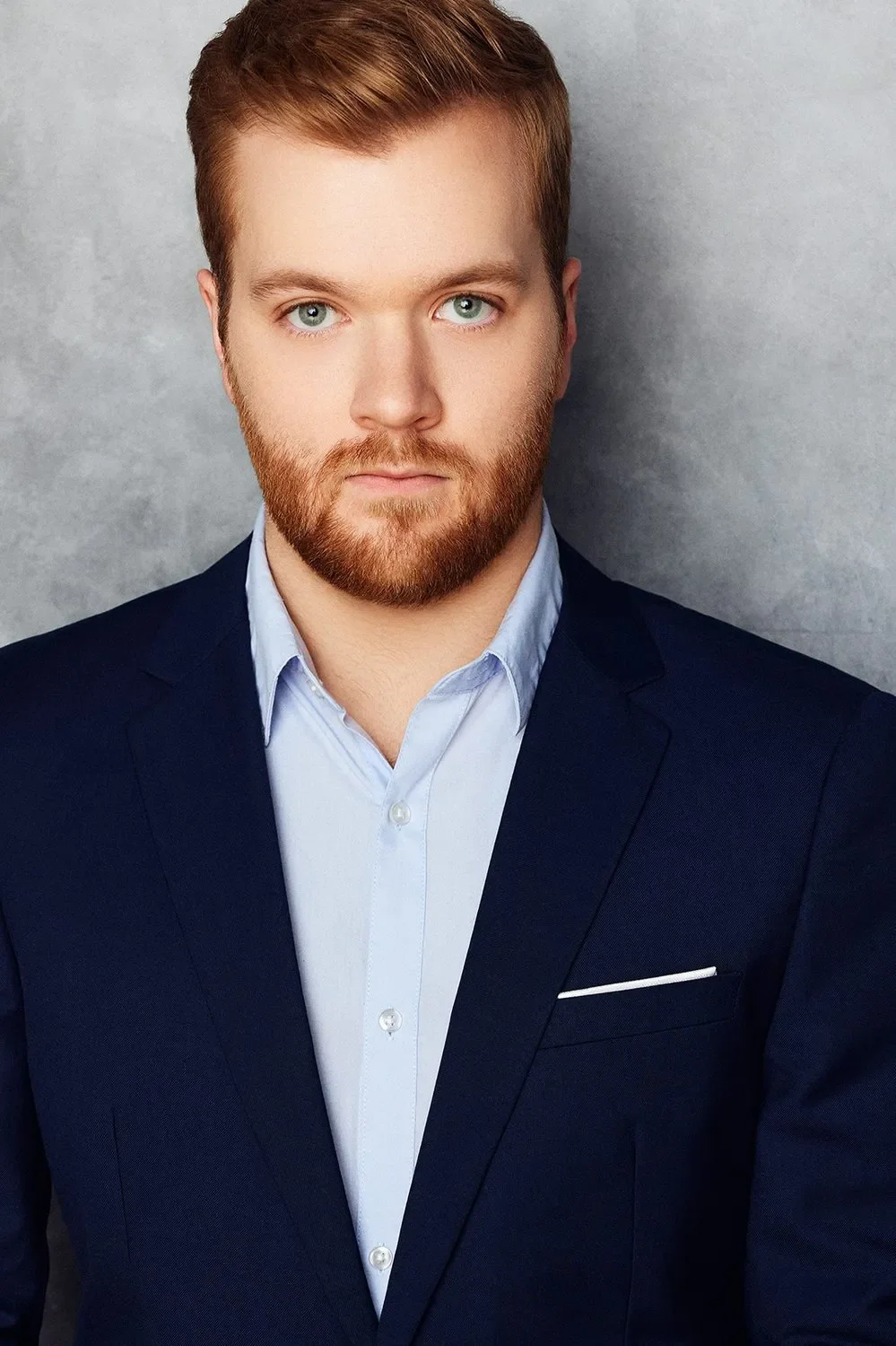 Headshot of Brenden Zwiebel wearing a suit