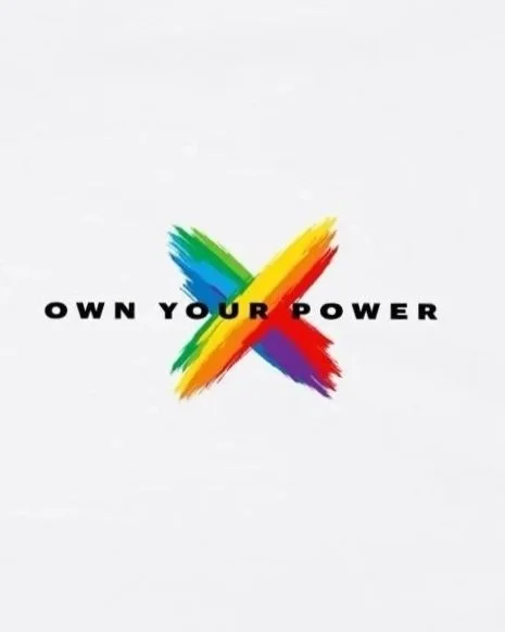 An Australian logo design by Pickleball Merch Aus for its sports apparel range, showing a colourful painted X with the words "Own Your Power" across the centre.