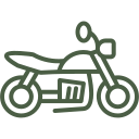Moto verde con sedile e manubrio