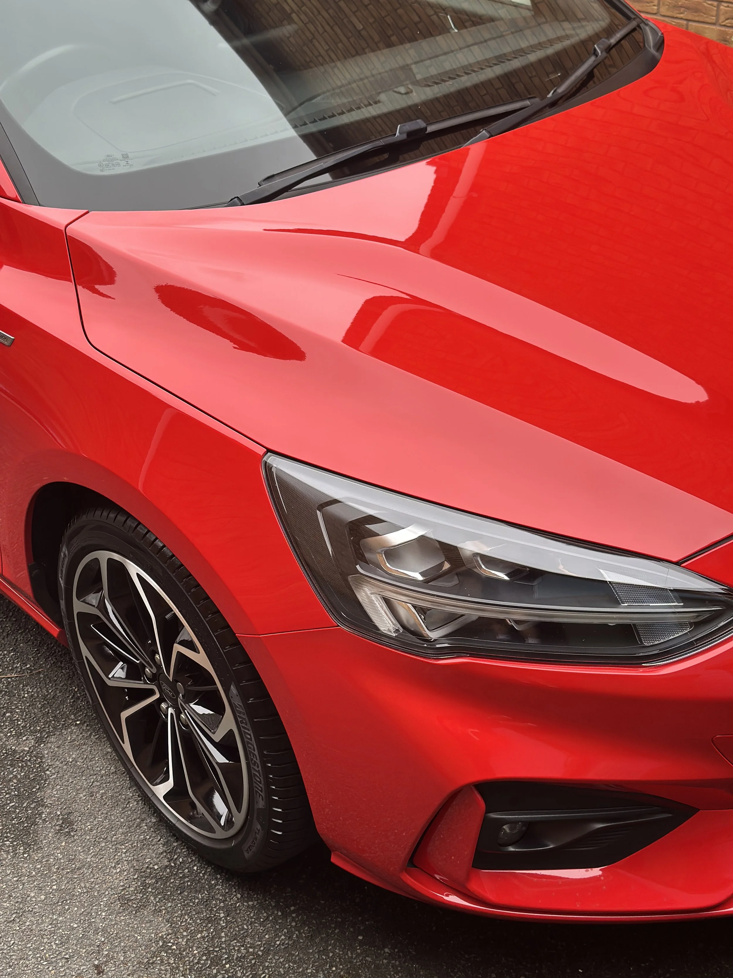 This red Ford Focus underwent a full paint correction to remove defects and restore clarity across every panel. Once the finish was perfected, a 5‑year ceramic coating was applied to lock in the gloss, enhance colour depth and provide long‑term prote