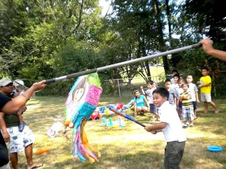 2010+july+adriel+hitting+the+pinata+1.jpg