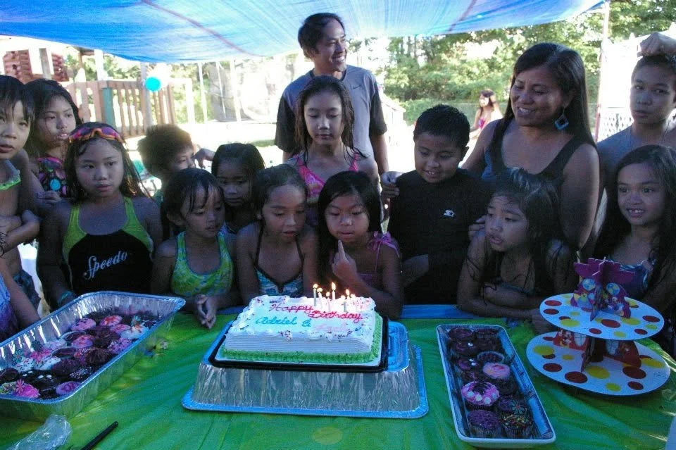 2012 july bday jael blowing cake2.jpg