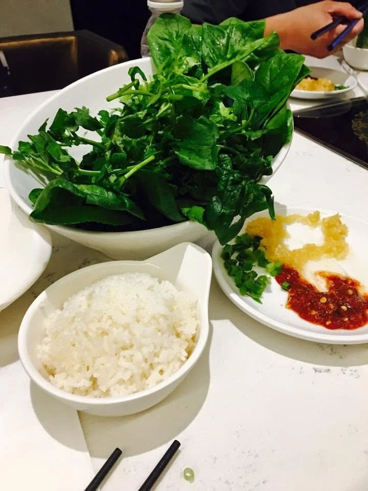 Greens, rice, and condiments at our Brooklyn Chinatown hotpot meal, October 2016.