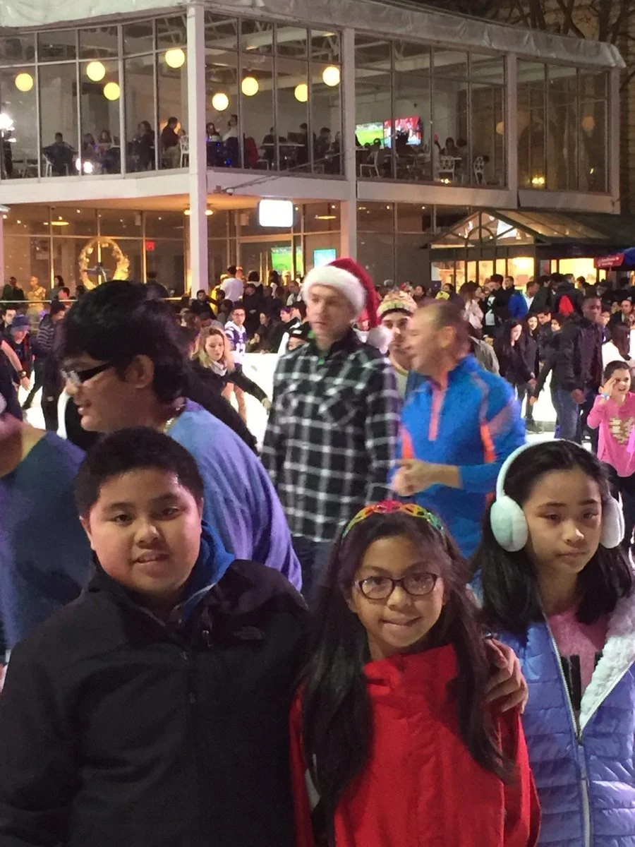My son and daughter on the ice at Bryant Park.