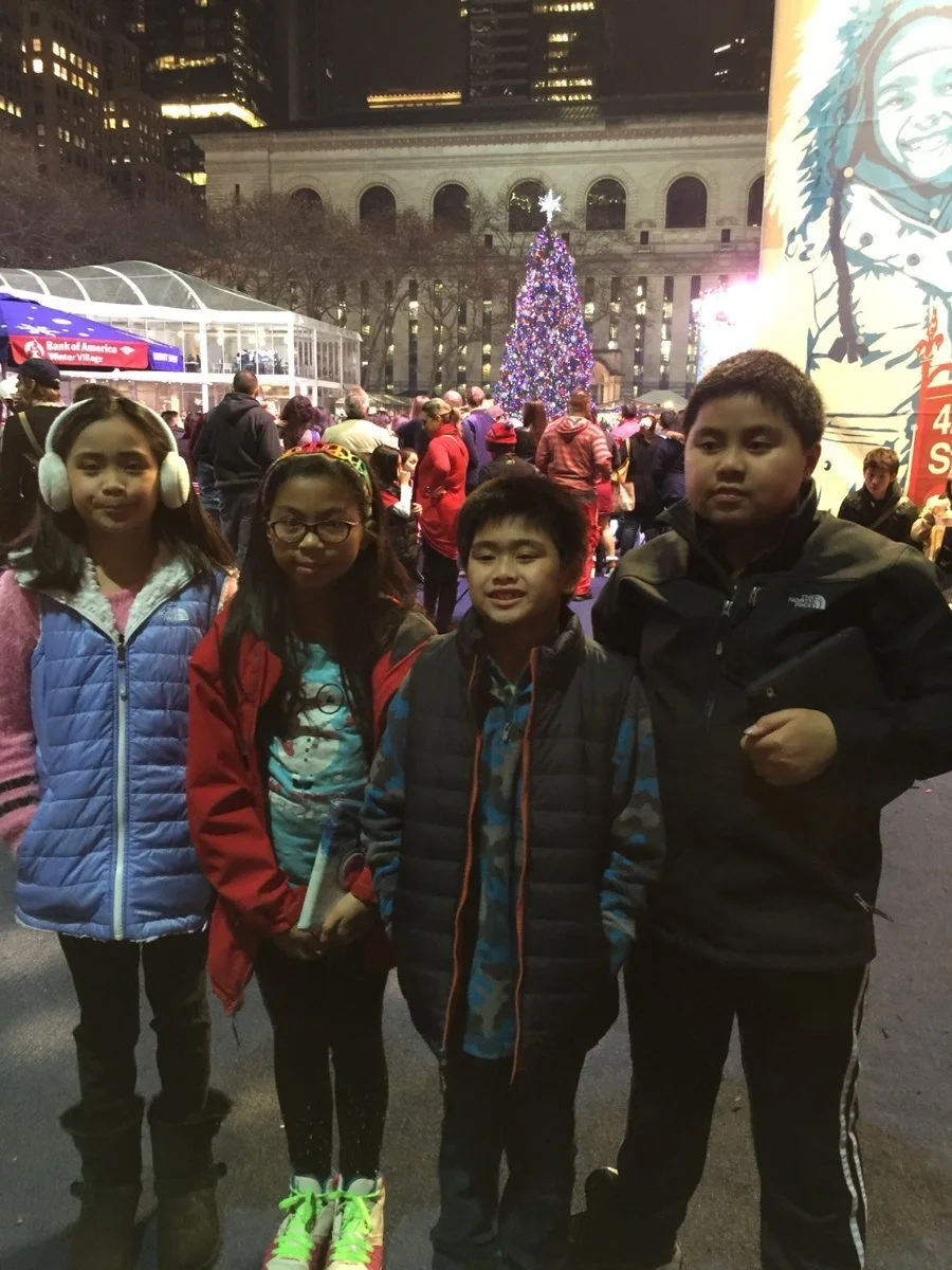 A family skating outing at Bryant Park’s Winter Village.