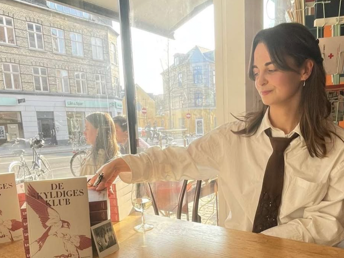 Book signing at the launch of De Skyldiges Klub, (Copenhagen, 2025).