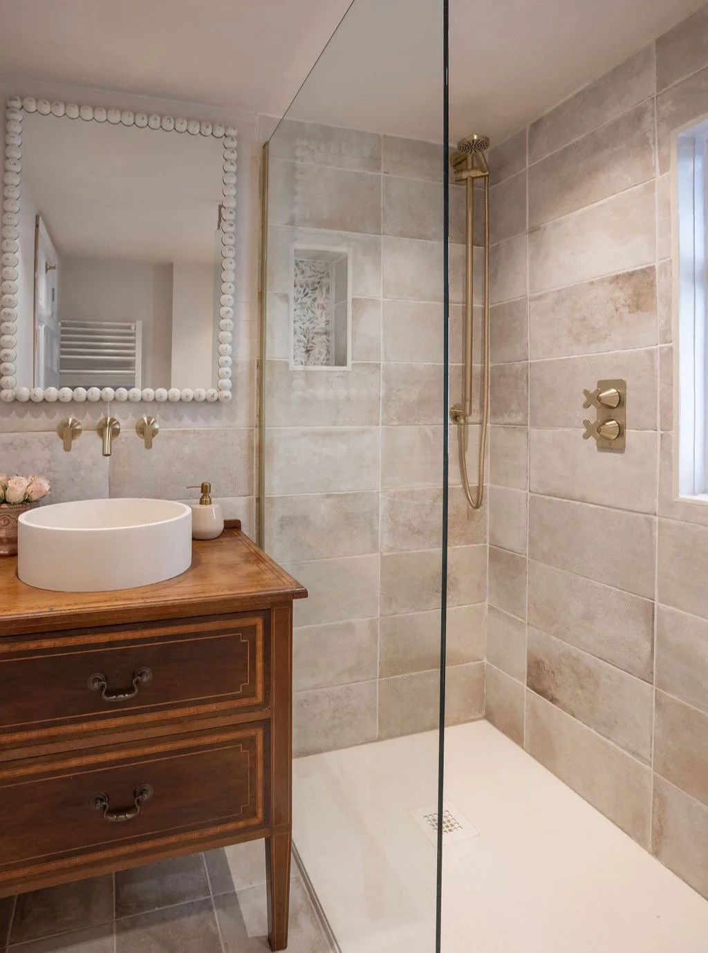 Project Rosa 

A first look at this quietly considered ensuite.

Created around our client&rsquo;s love of detail, this space combines soft tones, floral touches and an antique vanity to create a peaceful retreat.

Reworking the layout improved funct