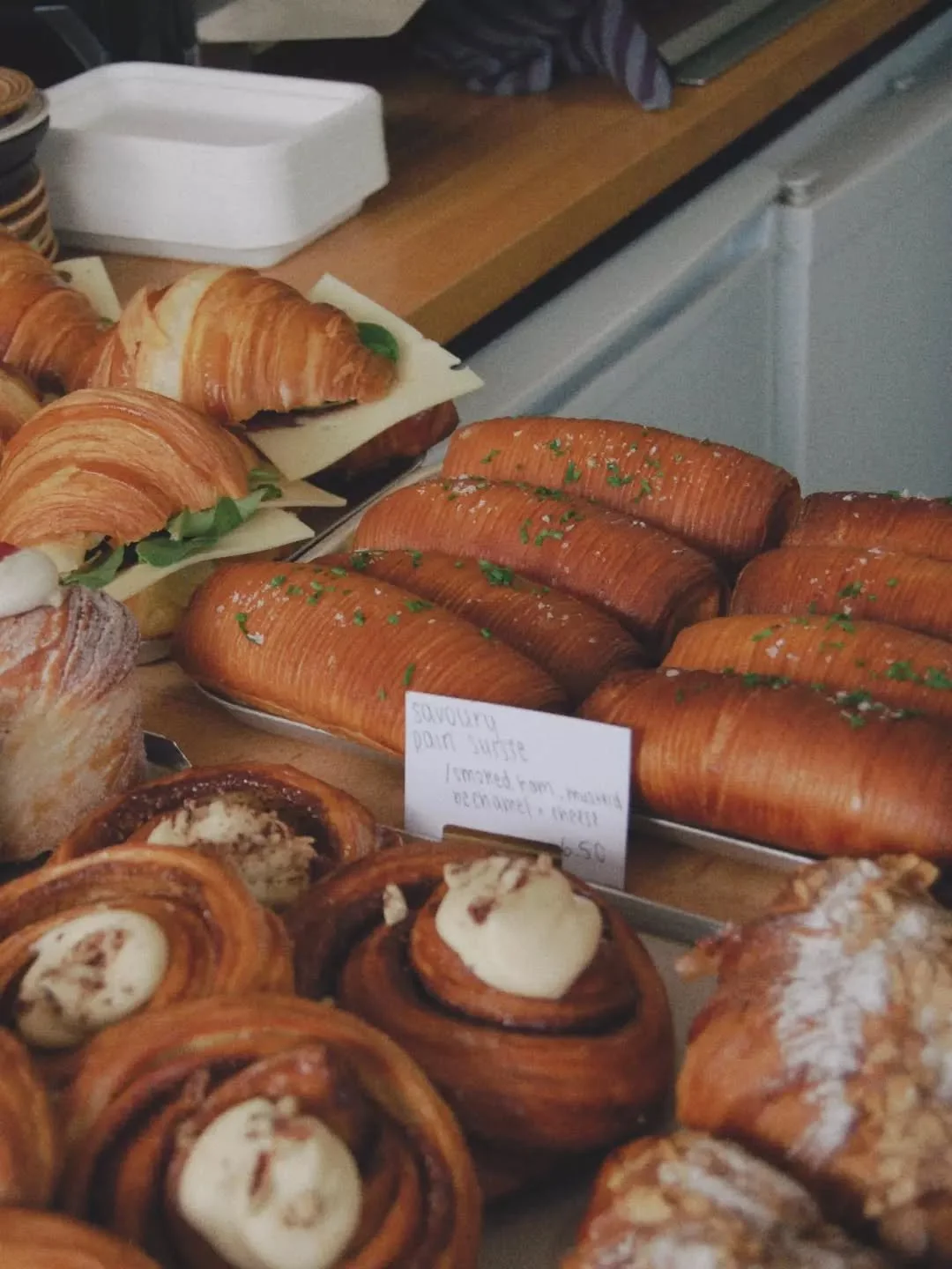 From counter, to a seat with a view.
Smoked ham, mustard b&eacute;chamel &amp; cheese pain suisse are still available and made fresh every day. 
Open 8-3pm every single day 😎