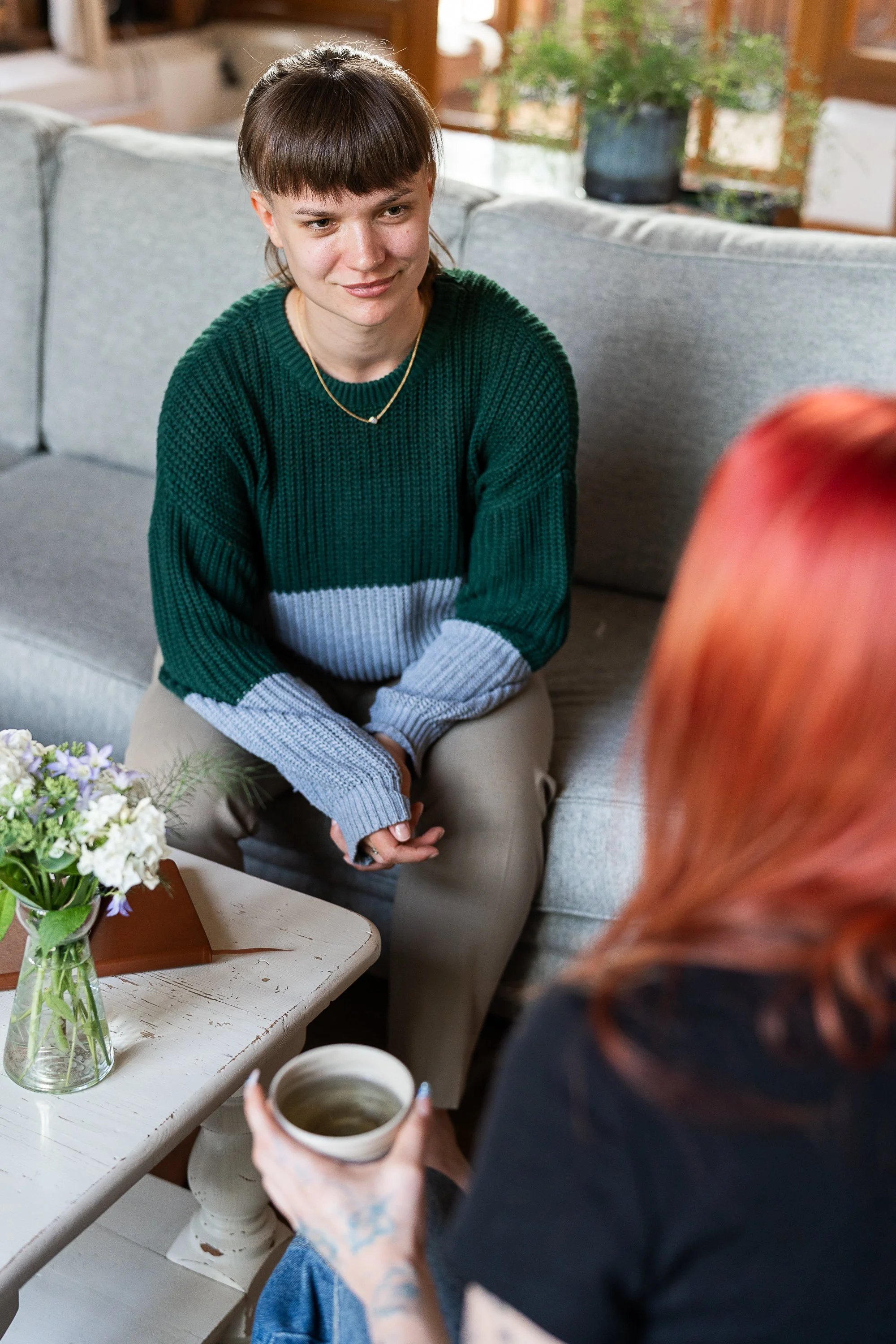 LGBTQIA+ affirming therapist in Greenwich, delivering in-person sessions to client.