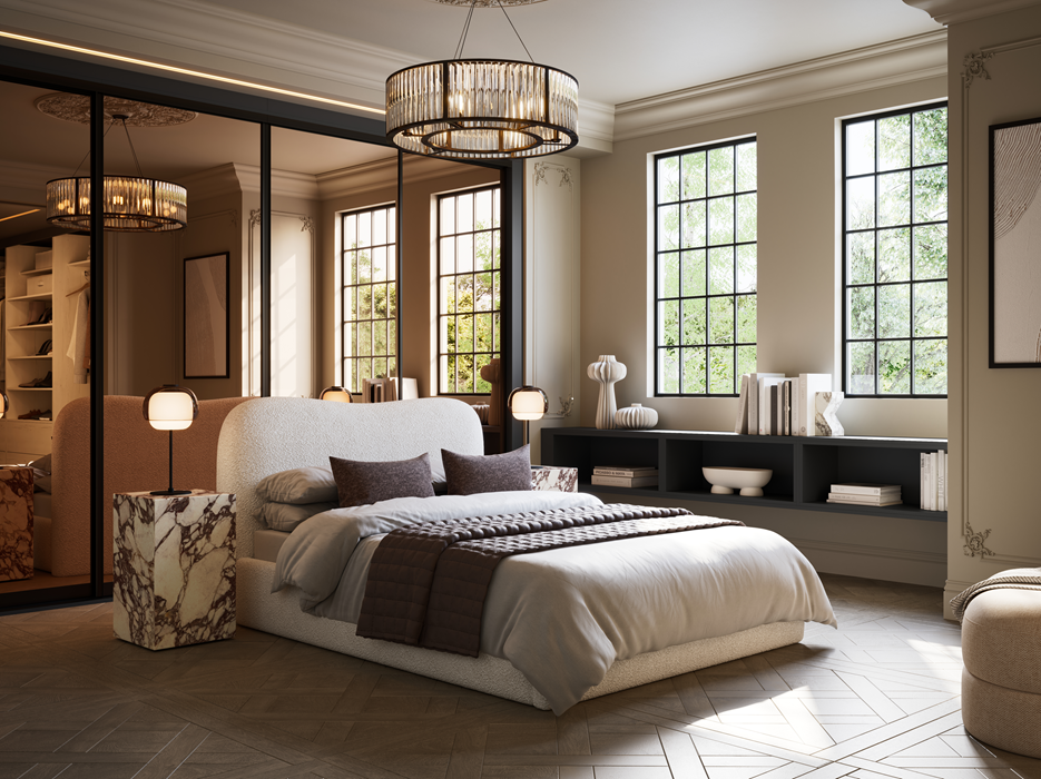 Modern bedroom with large windows, a white upholstered bed with pillows and a quilt, marble bedside table with a small lamp, built-in shelves with decor and books, and a chic ceiling light fixture.