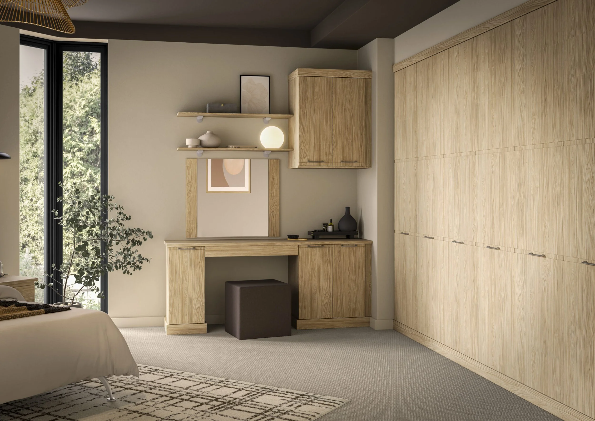 Interior view of a room with light wood furniture, including a large wardrobe, a small desk with a brown stool, and wall shelves with decorative items and a spherical light. A large window with a black frame shows greenery outside, and a plant is partially visible in the corner. The room has a neutral color palette with beige walls and gray carpet.