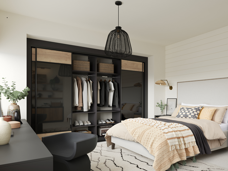 Modern bedroom with a bed, decorative pillows, and a large open closet with clothes and shelves.