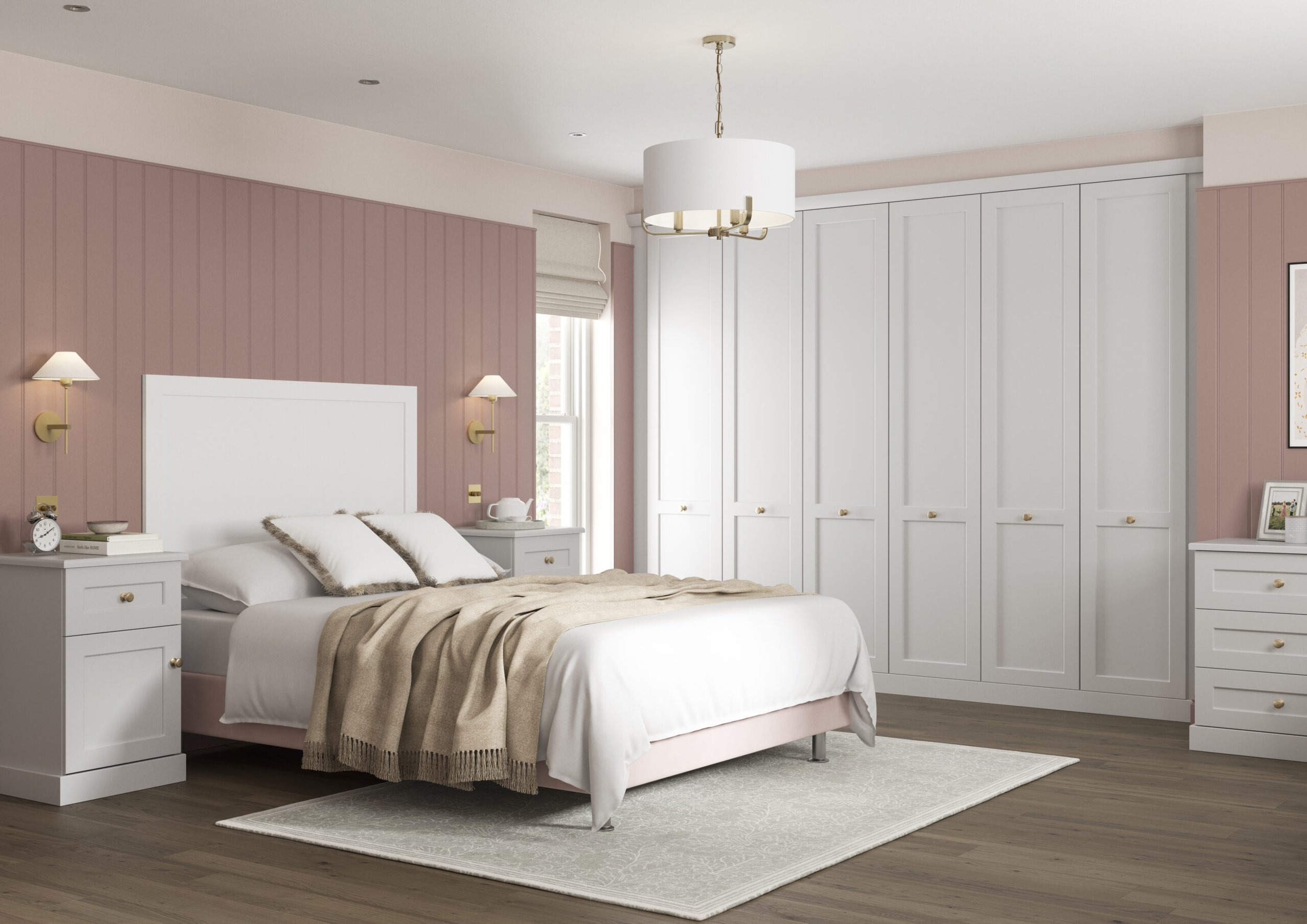A bedroom with a white bed frame, beige bedding, and two white nightstands with gold handles. The room has pink and white walls, a white closet, and a window with shades. There are wall-mounted lamps and a modern ceiling light.