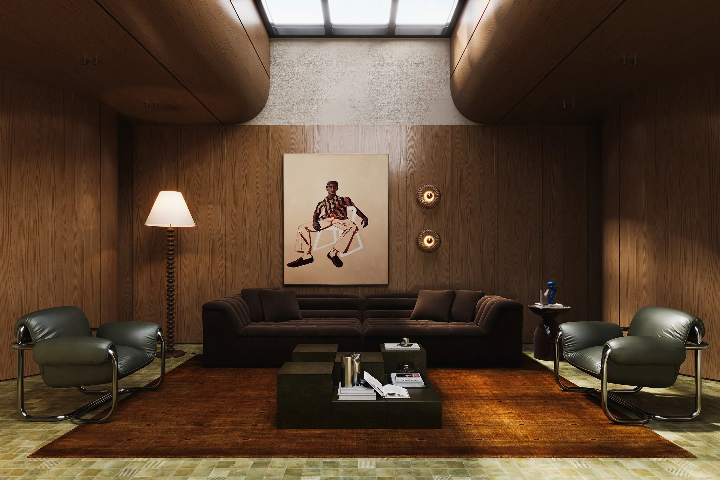 A modern living room with wooden wall paneling, a brown velvet sofa, a black coffee table with books and decor, surrounded by green armchairs, a floor lamp, and artwork on the wall. There is a ceiling skylight allowing natural light to enter.